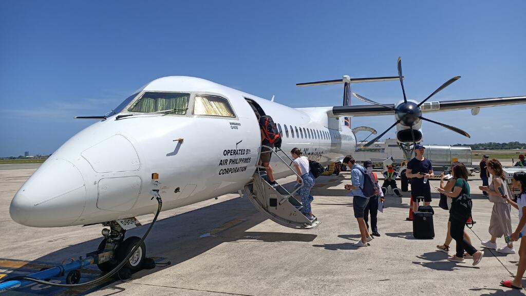 passengers boarding flight to Siargao