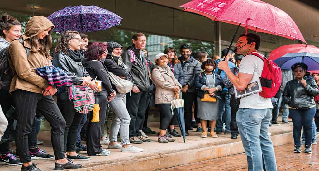 Tourists line up for the walking tour